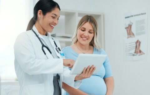 Shot of a doctor during a consultation with a pregnant patient in a clinic