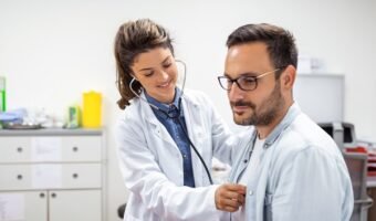 Young,Doctor,Is,Using,A,Stethoscope,Listen,To,The,Heartbeat