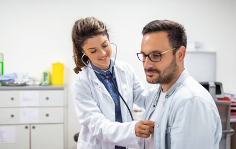 Young,Doctor,Is,Using,A,Stethoscope,Listen,To,The,Heartbeat