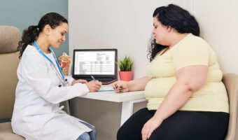 Dietitian consultation. Woman visits nutritionist for treatment obesity